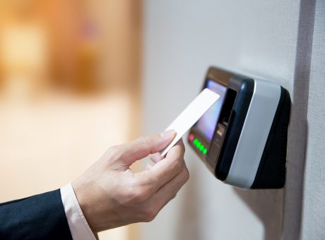 Engineers using key card to identity verification for access the door or entre the security room.