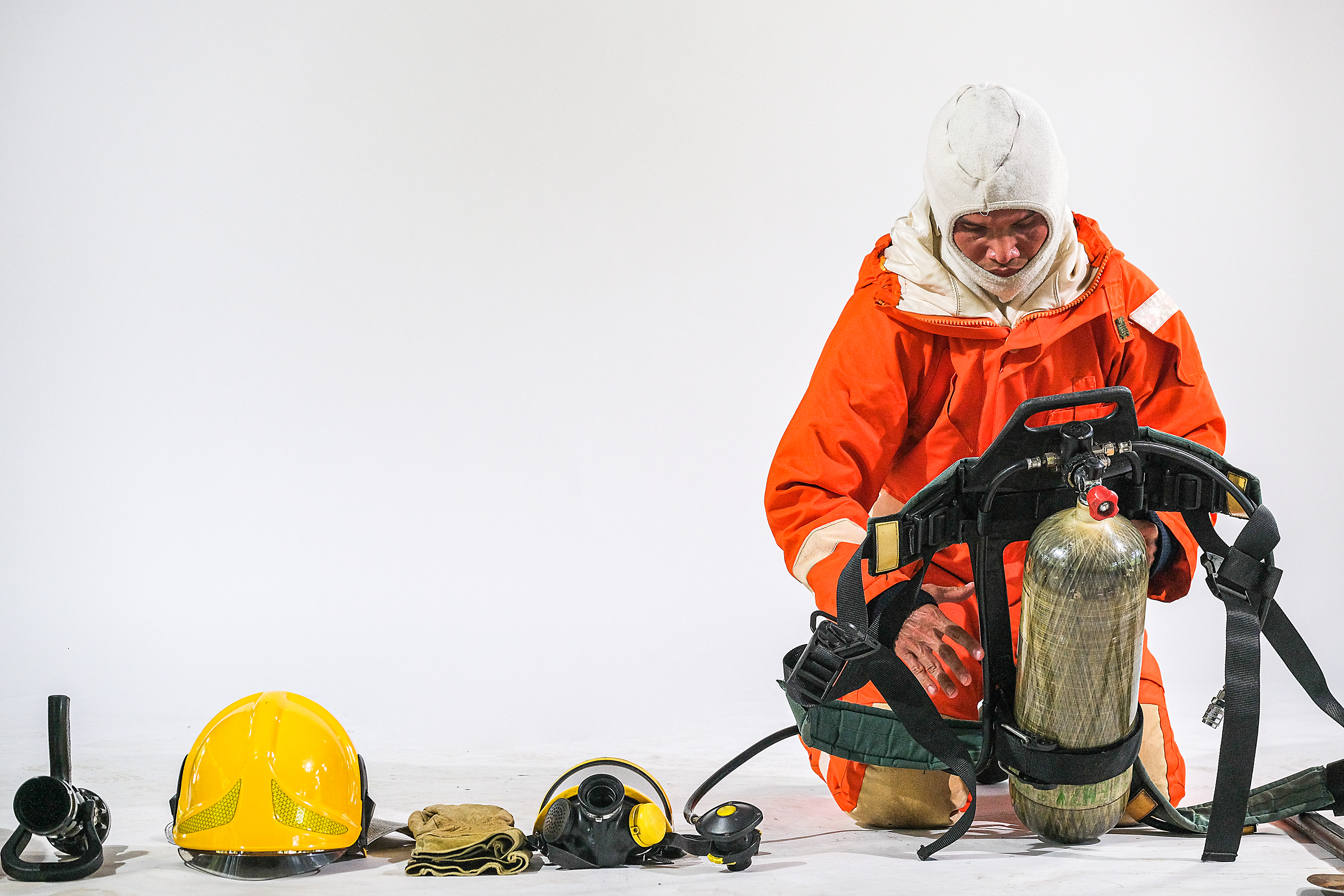 firefighter-demonstrates-wearing-uniforms-helmets-various-equipment-prepare-firefighters-white-background